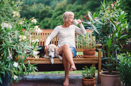Woman on garden bench